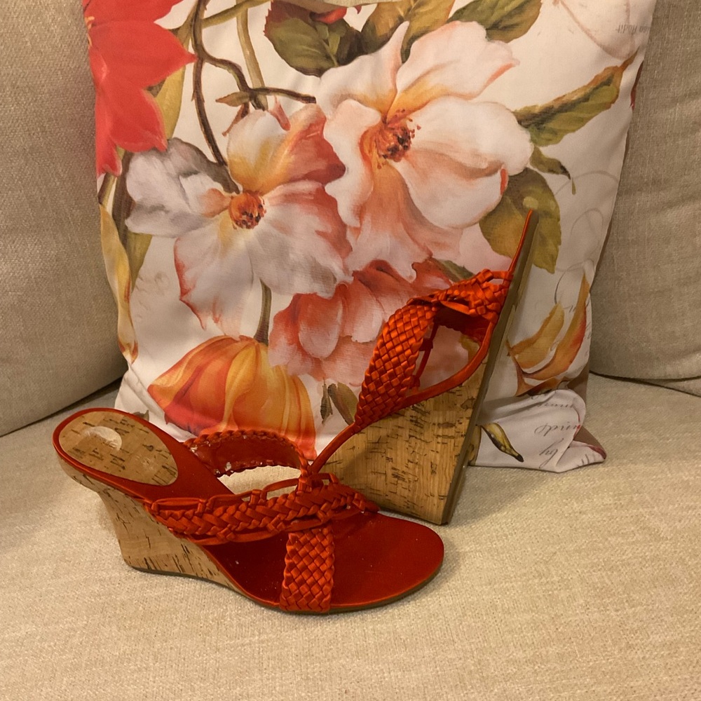 These are Nine West shoes size 7 1/2 satin orange material wedge heel.